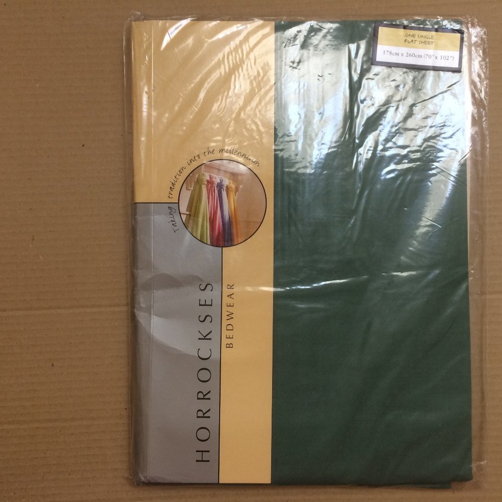 - Single bed flat cotton sheets in original packing